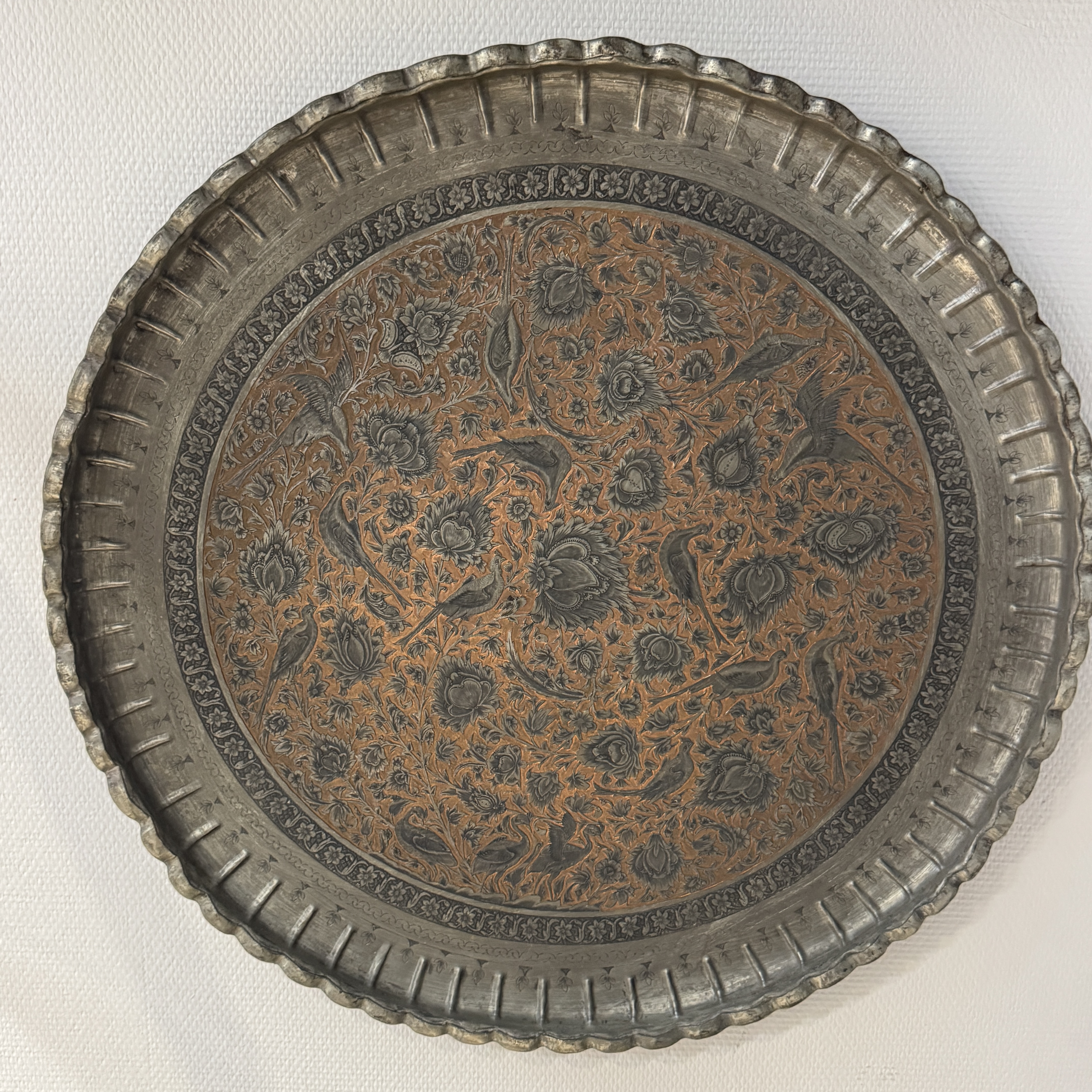 A large Persian engraved tinned-copper tray with birds among flowers — photo 1