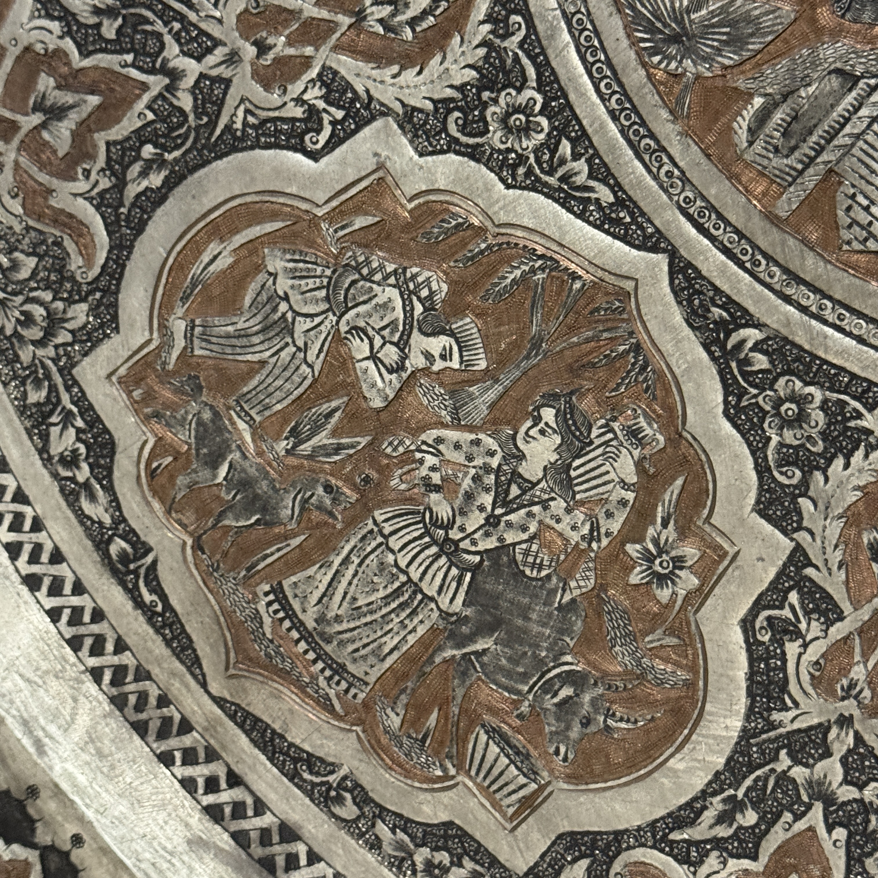 A large Persian engraved tinned-copper tray with narrative design — photo 13
