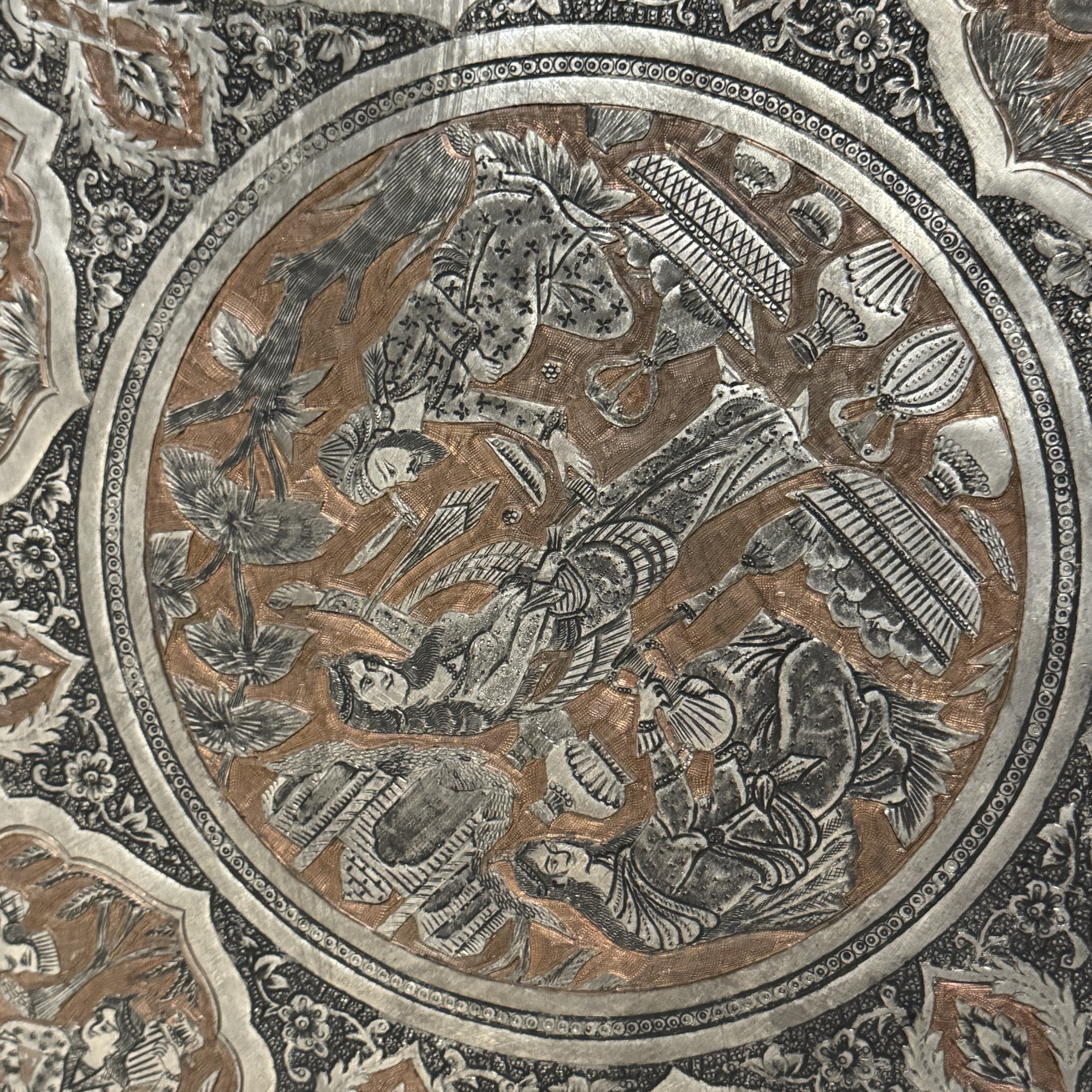 A large Persian engraved tinned-copper tray with narrative design — photo 18
