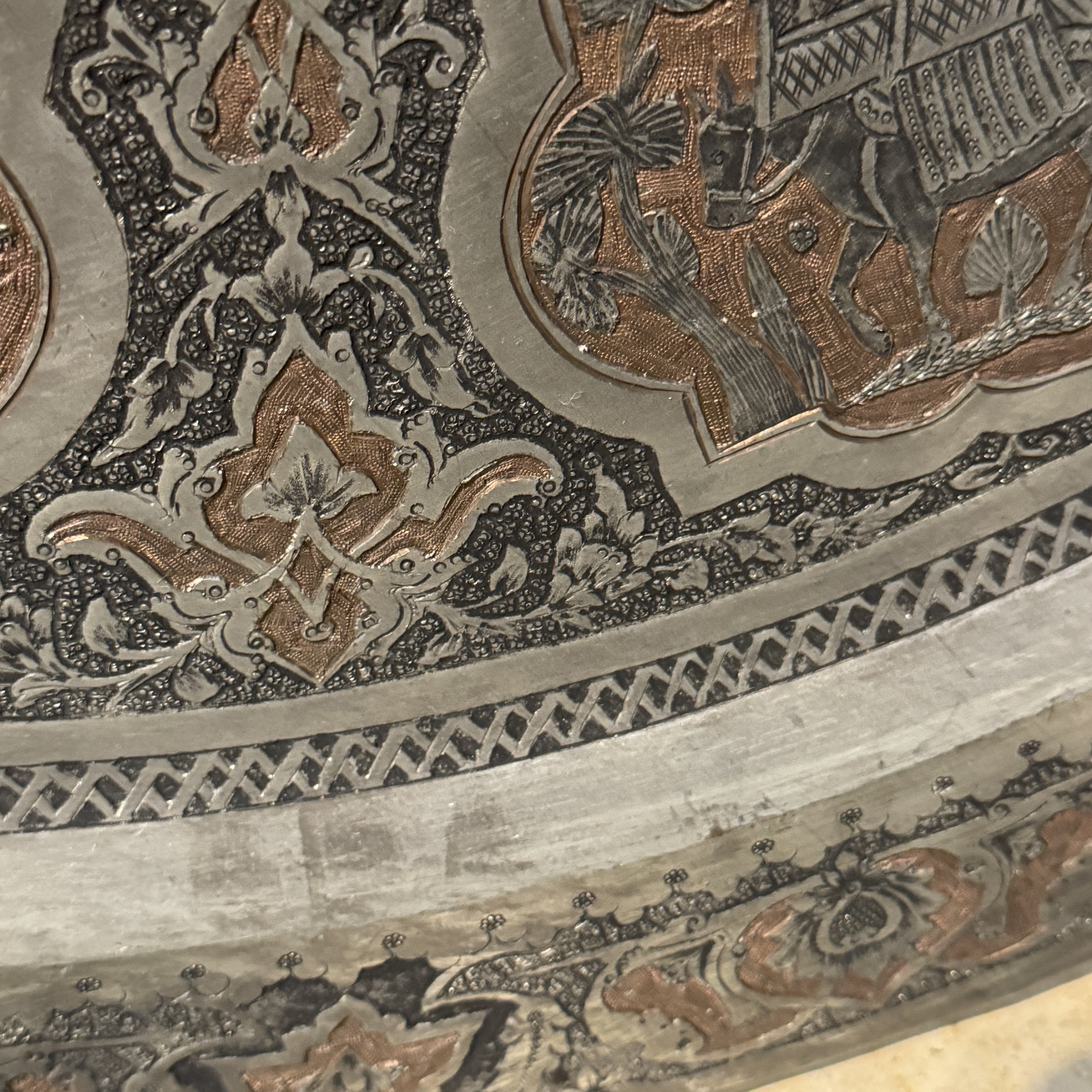 A large Persian engraved tinned-copper tray with narrative design — photo 20