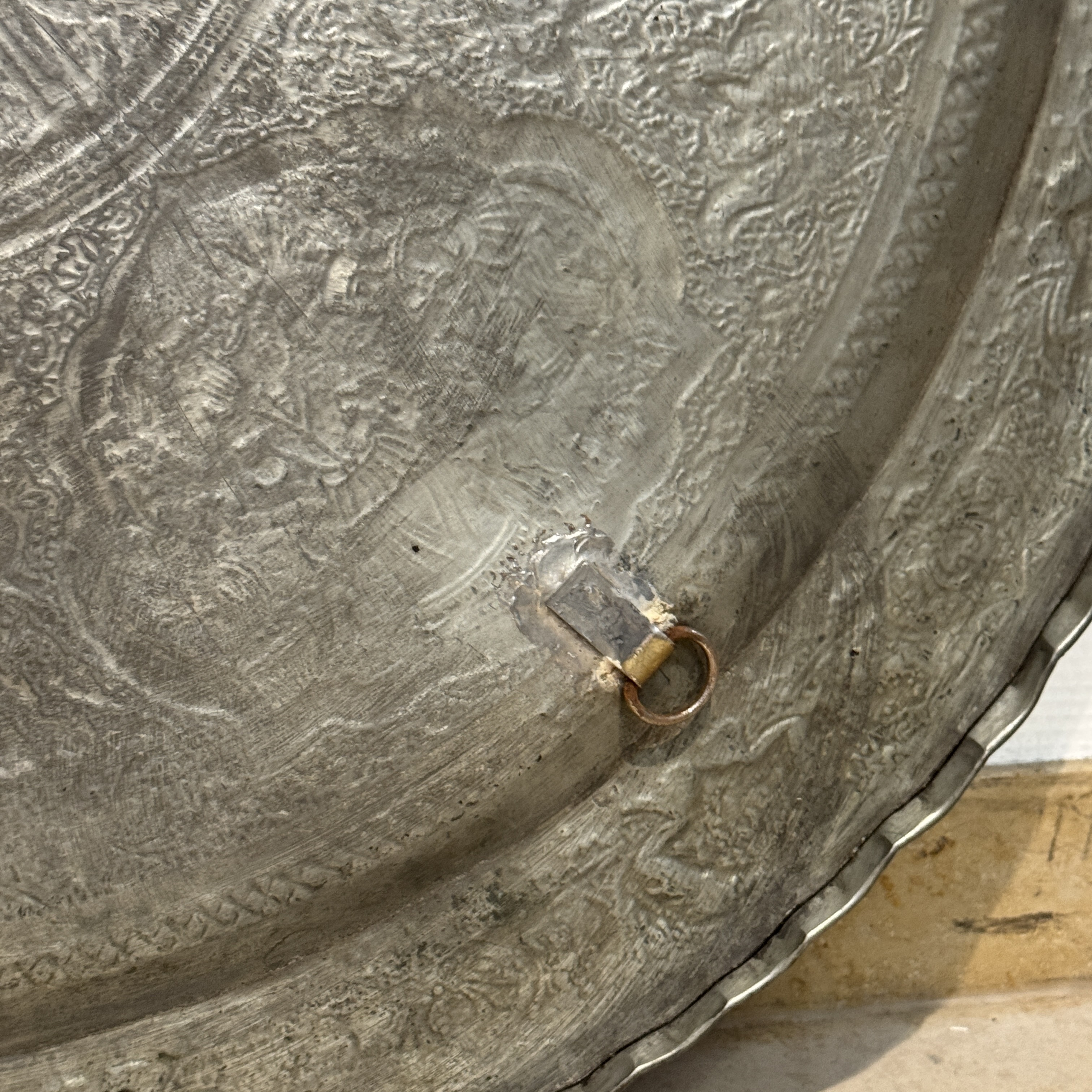 A large Persian engraved tinned-copper tray with narrative design — photo 23