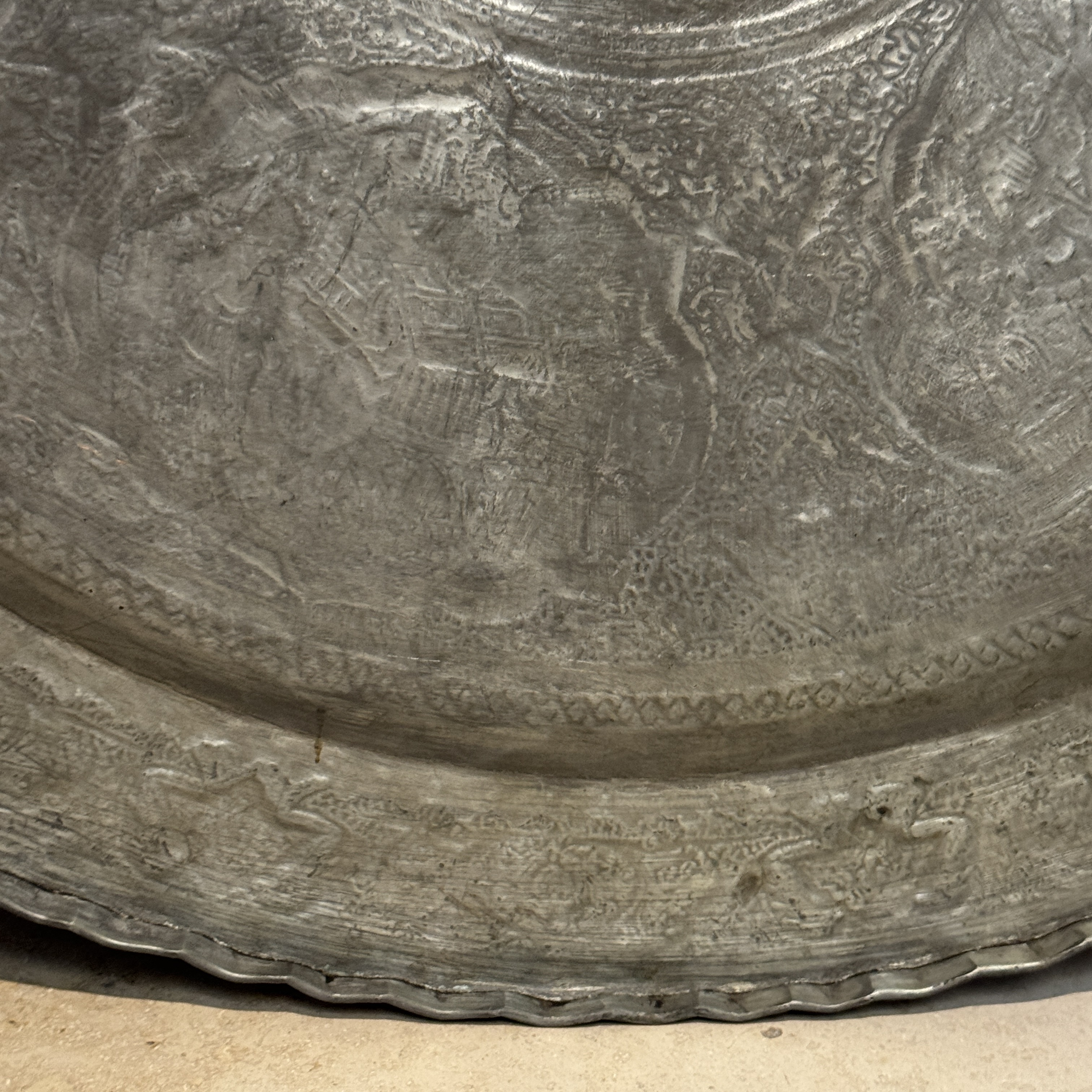 A large Persian engraved tinned-copper tray with narrative design — photo 24