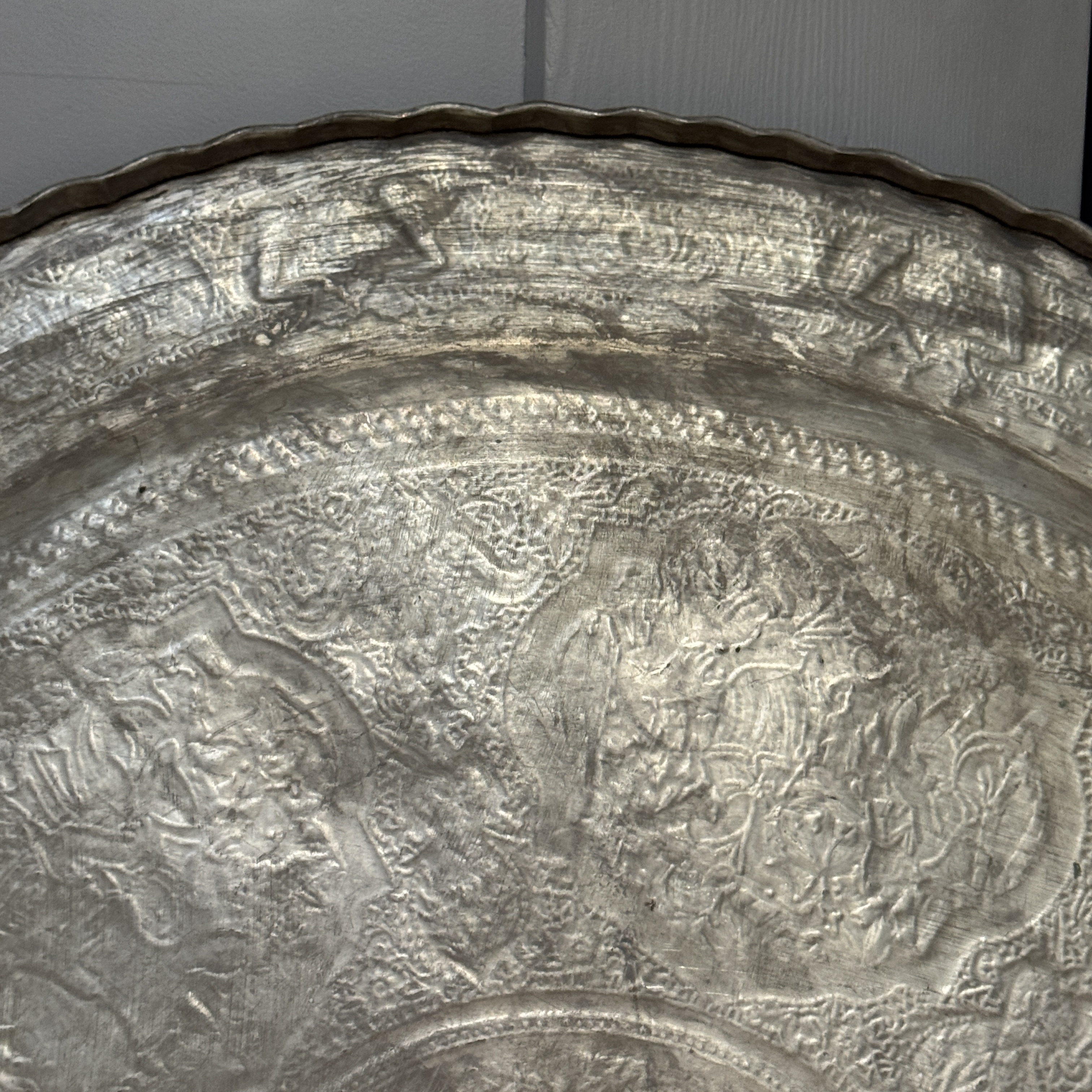 A large Persian engraved tinned-copper tray with narrative design — photo 27