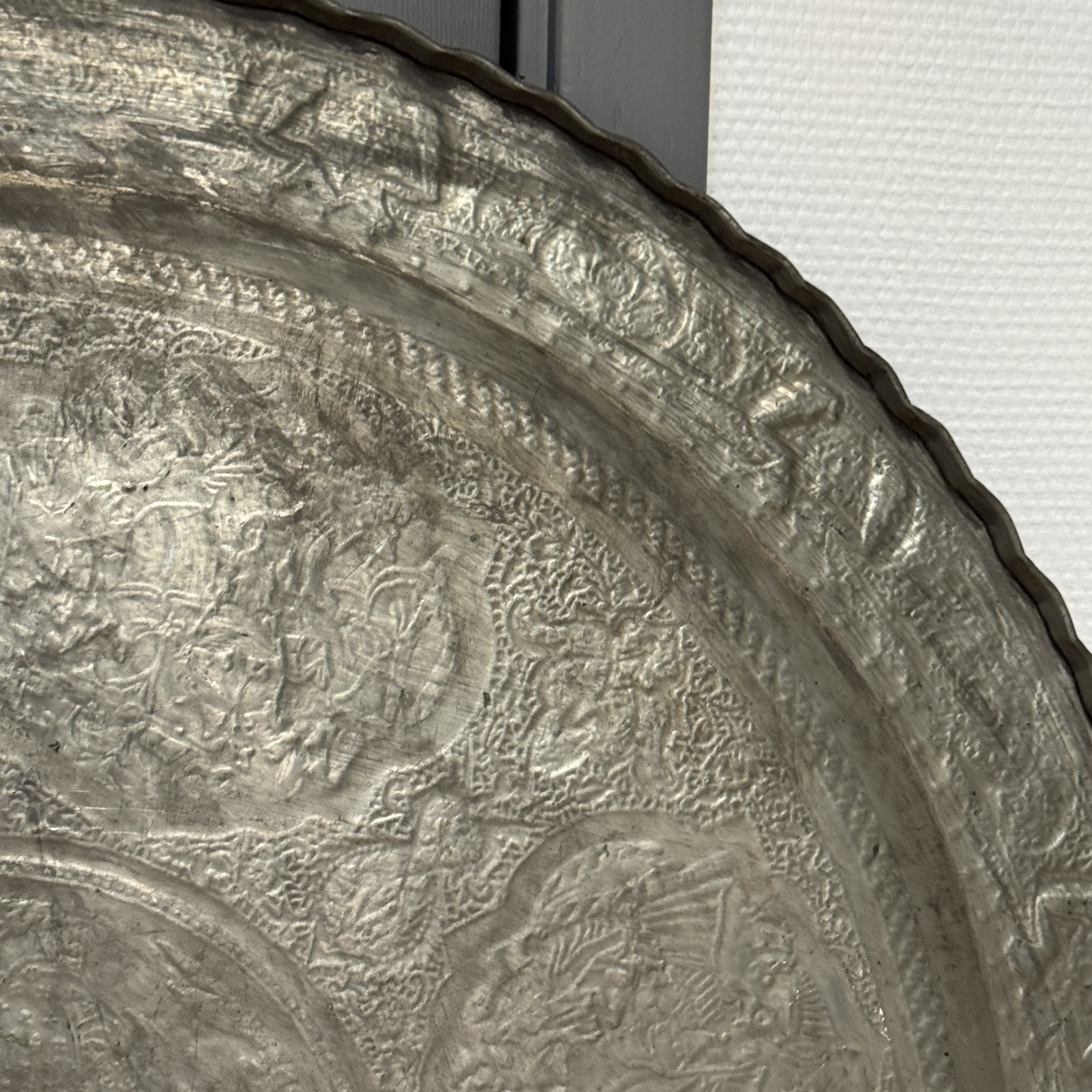 A large Persian engraved tinned-copper tray with narrative design — photo 28