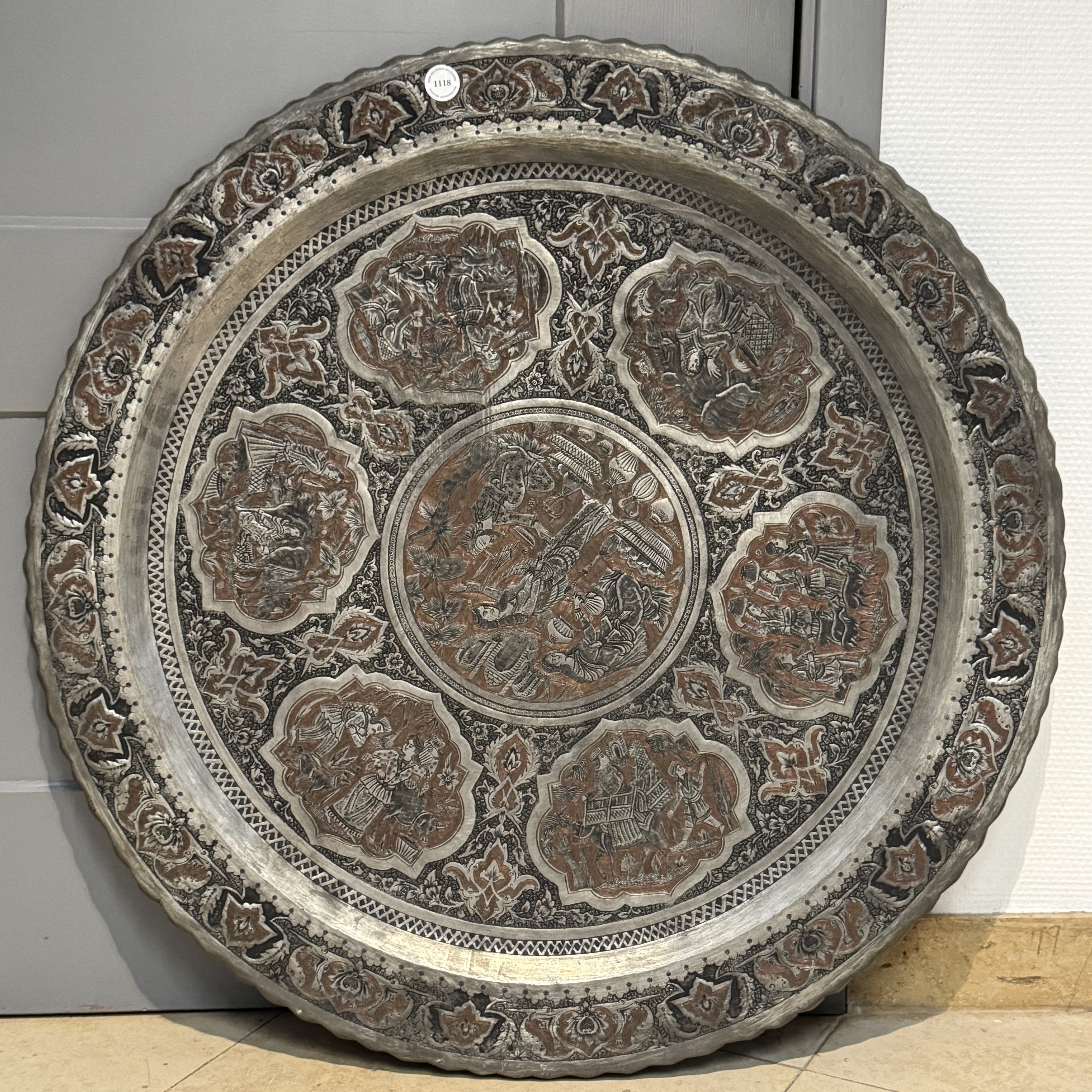 A large Persian engraved tinned-copper tray with narrative design — photo 1