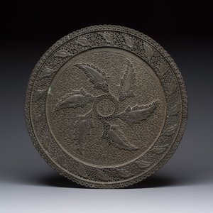 A large Persian reticulated copper-alloy dish with paisley design, Qajar, 19th C. — photo 1