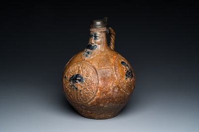 A large pewter-lidded armorial stoneware bellarmine jug with portrait medallions, Frechen, Germany, dated 1603 and 1605