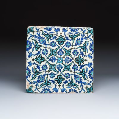 A large polychrome Damascus pottery tile with ornamental floral design, early 17th C.