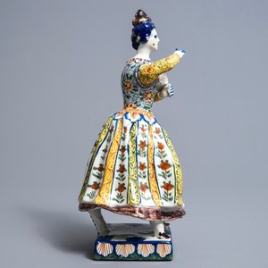 A large polychrome Dutch Delft model of a lady with a dog, 18th C. — 照片 3