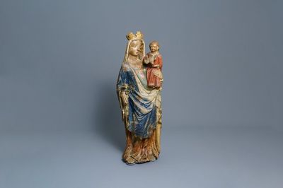 A large polychromed limestone figure of a Madonna with child, Champagne or Lorraine province, France, 2nd half 14th C.