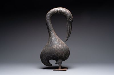 A large Qajar damascened steel bird-form sculpture, Persia, 19th C.