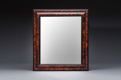 A large rectangular tortoiseshell-veneered and ebonised wood frame with later mirror, probably Flanders, 19th C.