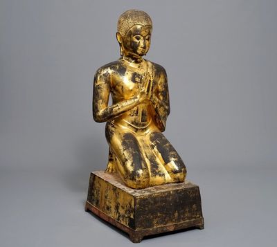 A large Thai gilt bronze figure of Moggallana, Ayutthaya period, 17th C.