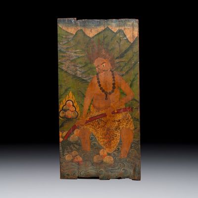 A large Tibetan polychrome-painted wood 'Guardian' panel or door, 19th C.