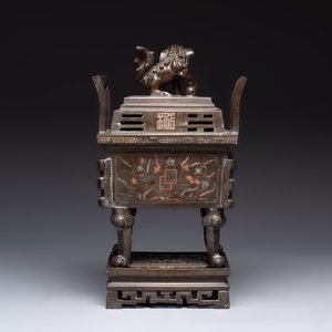A large Vietnamese copper- and silver-inlaid rectangular 'Buddhist lion' censer and cover on stand, 19th C. — photo 4