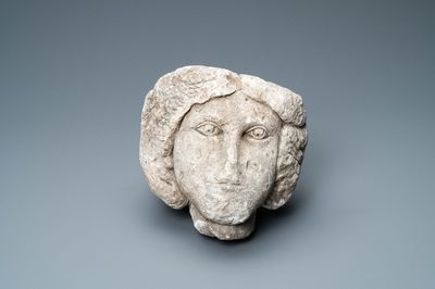 A limestone head of a woman, 16th C.