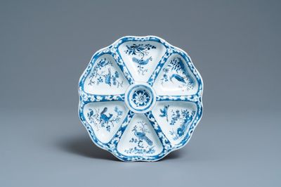 A lobed Dutch Delft blue and white spice dish with birds, late 17th C.