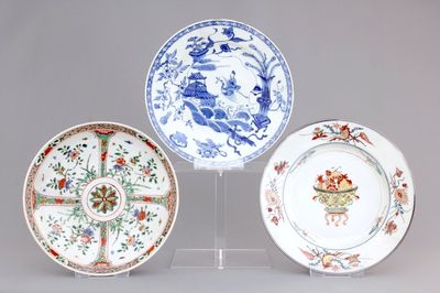 A lot of 3 Chinese porcelain plates: famille verte, blue and white and verte-imari, 18th C.