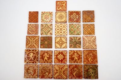 A lot of Flemish decorated redware tiles in medieval style, 17/19th C.