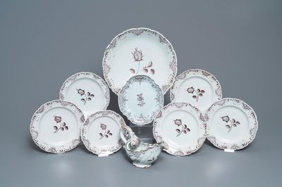 A manganese Dutch Delft part service with a sauce boat on stand, a dish and six plates, 18th C.