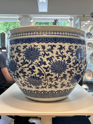 A massive Chinese blue and white 'lotus scroll' fish bowl, Qianlong/Jiaqing — photo 1