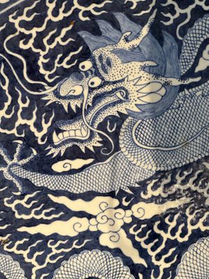A massive Chinese blue and white reverse-decorated  'dragon' charger with bronze mounts, Chuxiu Gong Zhi mark, Guangxu — photo 12