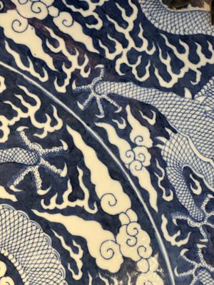 A massive Chinese blue and white reverse-decorated  'dragon' charger with bronze mounts, Chuxiu Gong Zhi mark, Guangxu — photo 17