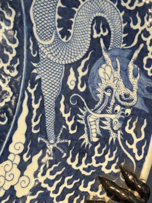A massive Chinese blue and white reverse-decorated  'dragon' charger with bronze mounts, Chuxiu Gong Zhi mark, Guangxu — photo 18