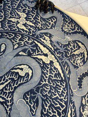 A massive Chinese blue and white reverse-decorated  'dragon' charger with bronze mounts, Chuxiu Gong Zhi mark, Guangxu — photo 7