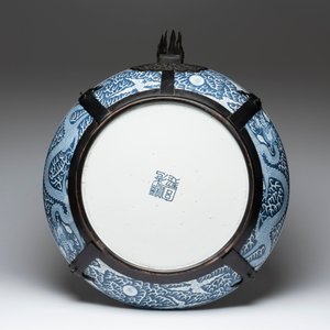 A massive Chinese blue and white reverse-decorated  'dragon' charger with bronze mounts, Chuxiu Gong Zhi mark, Guangxu — photo 4