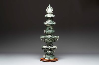 A massive Chinese jade pagoda on wooden stand, 20th C.