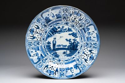 A massive Japanese Arita blue and white 'fisherman' dish, Edo, 17th C.