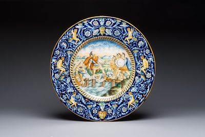 A massive polychrome Italian maiolica istoriato charger with a classical battle scene, 19th C.