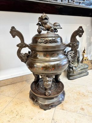A massive Vietnamese copper- and silver-inlaid 'Buddhist lion' censer and cover on stand, 19th C. — photo 1