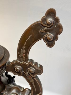 A massive Vietnamese copper- and silver-inlaid 'Buddhist lion' censer and cover on stand, 19th C. — photo 11