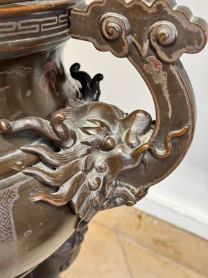 A massive Vietnamese copper- and silver-inlaid 'Buddhist lion' censer and cover on stand, 19th C. — photo 12