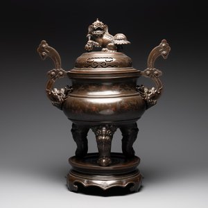 A massive Vietnamese copper- and silver-inlaid 'Buddhist lion' censer and cover on stand, 19th C. — photo 1