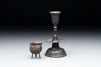 A miniature pewter candlestick and grape, excavated in Rotterdam, 16/17th C. or earlier