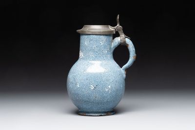 A monochrome blue Brussels faience pewter-mounted jug, 18th C.