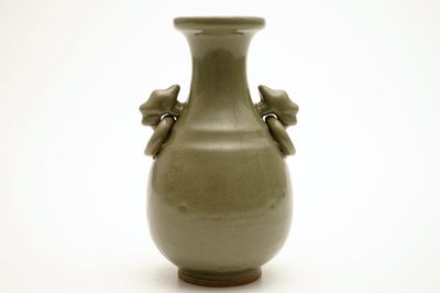 A monochrome Chinese celadon vase, 19th C.