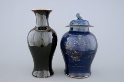 A monochrome Chinese mirror black and a bleu poudre with gilt vase, 18/19th C.