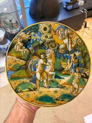 A mythological Italian maiolica istoriato plate with 'Saturn and Philyra' — photo 1