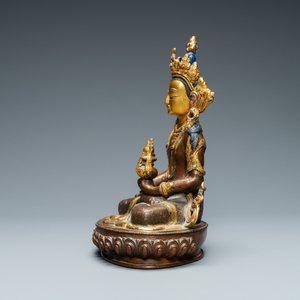 A Nepalese coral- and turquoise-inlaid partly gilded copper alloy figure of Buddha, 19/20th C. — 照片 2
