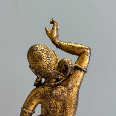 A Nepalese gilt-copper alloy figure of a dancing goddess — photo 10