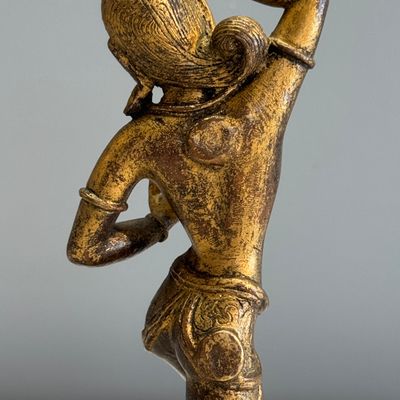 A Nepalese gilt-copper alloy figure of a dancing goddess — photo 11