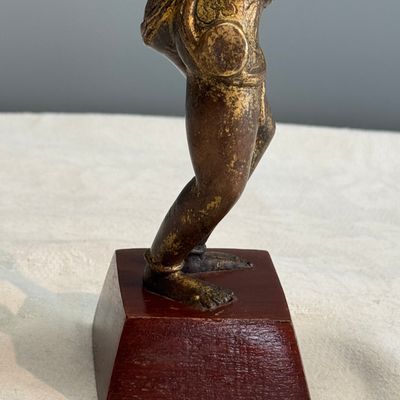 A Nepalese gilt-copper alloy figure of a dancing goddess — photo 12