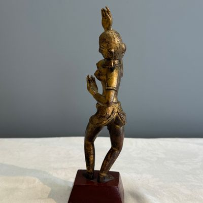 A Nepalese gilt-copper alloy figure of a dancing goddess — photo 13