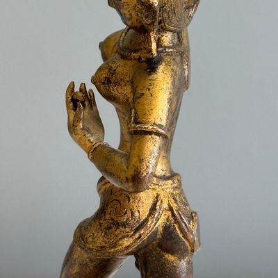 A Nepalese gilt-copper alloy figure of a dancing goddess — photo 15