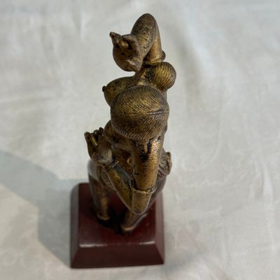 A Nepalese gilt-copper alloy figure of a dancing goddess — photo 17