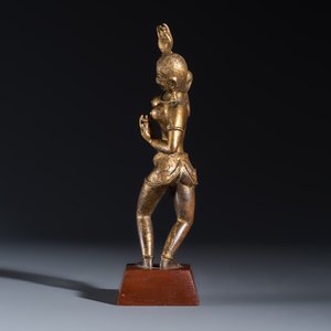A Nepalese gilt-copper alloy figure of a dancing goddess — photo 3